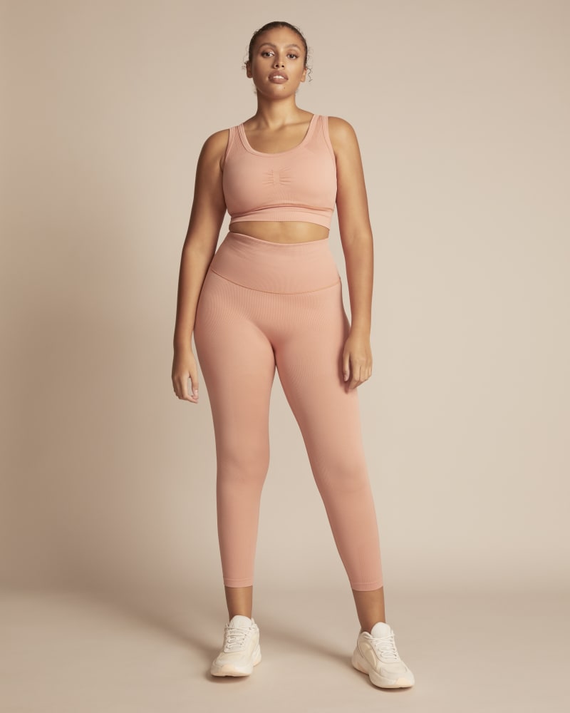 Front of a model wearing a size 1X 11 Honoré x Adidas Formotion Bra in Pink by Adidas x 11 Honoré. | dia_product_style_image_id:245729